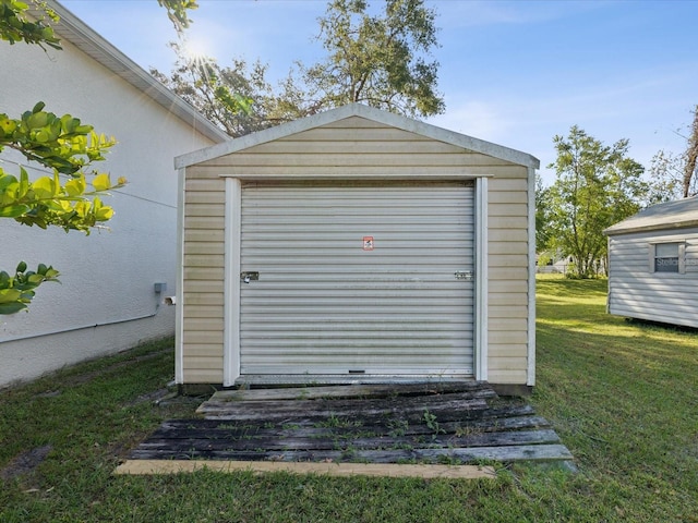 garage with a lawn