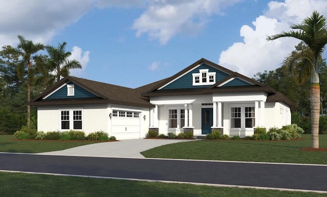 view of front of property with a front yard and a garage