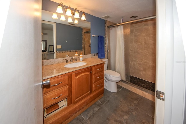 bathroom with vanity, a shower with shower curtain, toilet, and tile patterned floors