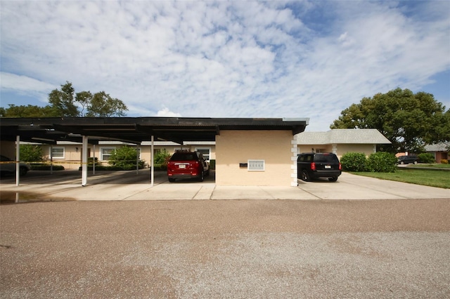 view of car parking with a carport