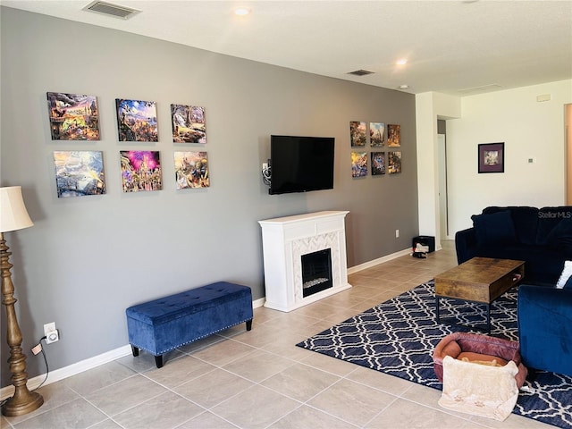 tiled living room with a fireplace