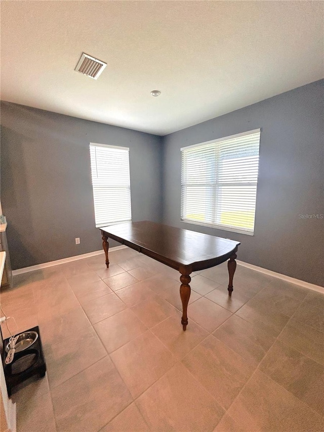 rec room with tile patterned floors