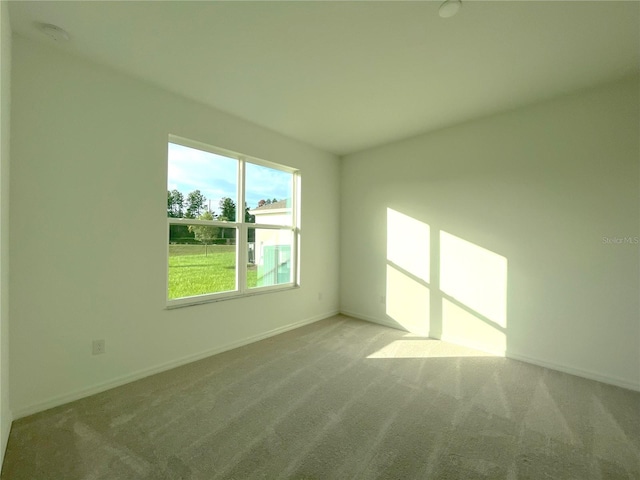 view of carpeted spare room