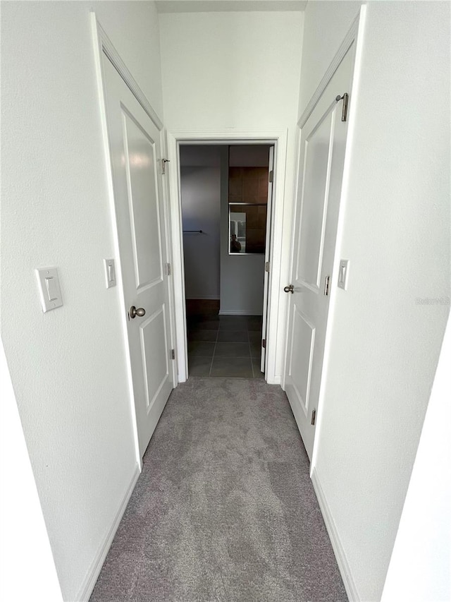 hallway with light carpet