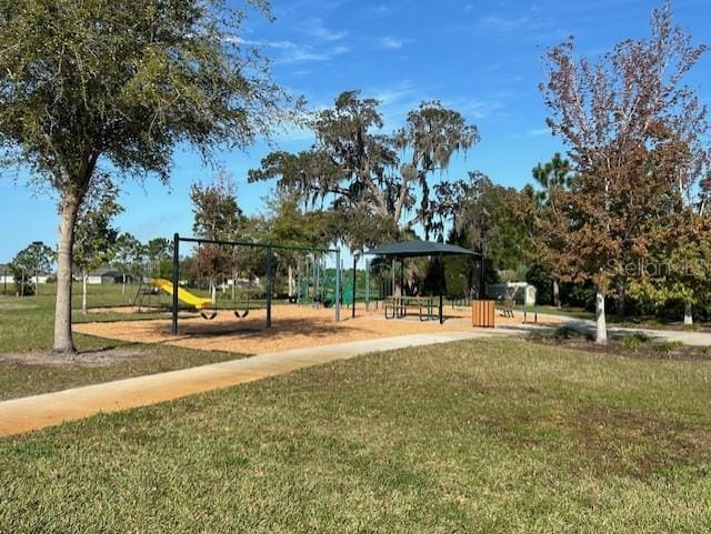 surrounding community with a gazebo, a playground, and a yard