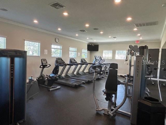 workout area with crown molding