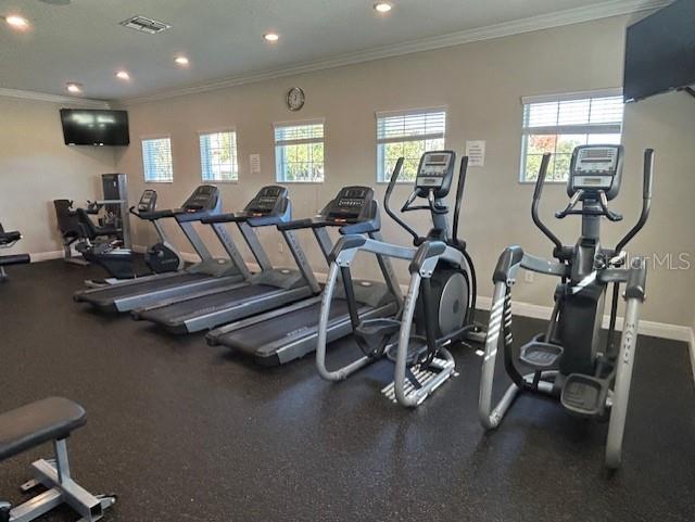 exercise room with crown molding