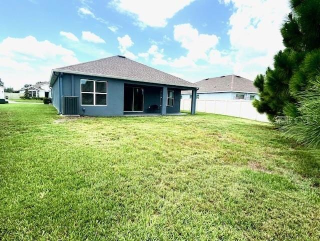 13447 Newport Shores Dr, Hudson, FL 34669 - rear view of property with stucco siding