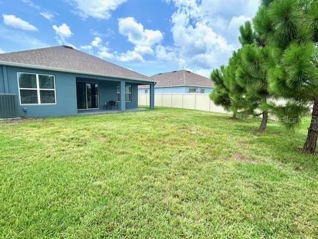 13447 Newport Shores Dr, Hudson, FL 34669 - rear view of house featuring stucco siding