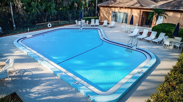 view of pool featuring a patio area