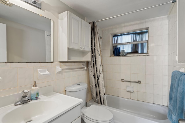 full bathroom with vanity, backsplash, toilet, tile walls, and shower / tub combo