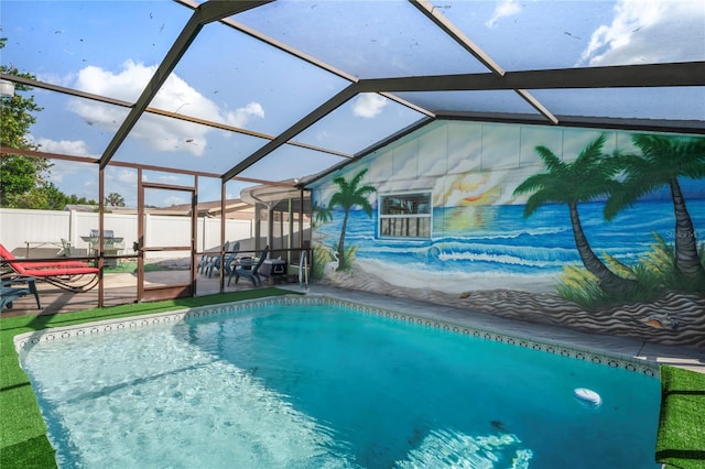 view of swimming pool with a lanai and a patio