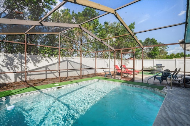 view of pool featuring a lanai and a patio