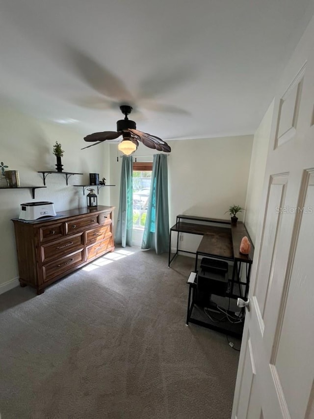 interior space featuring ceiling fan