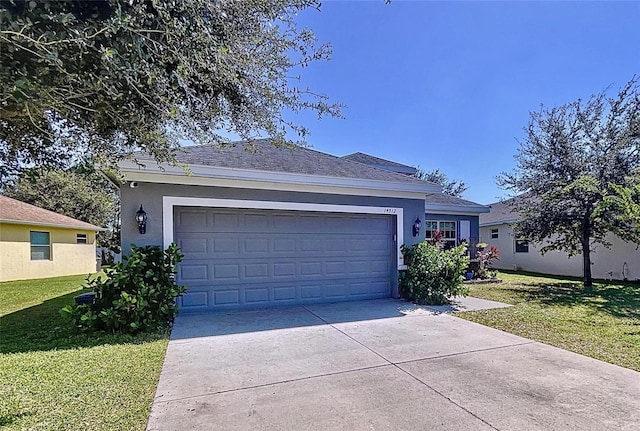 single story home featuring a front yard and a garage