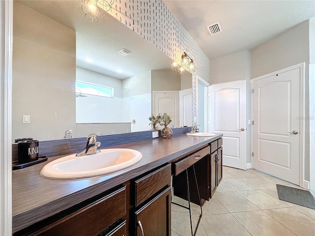 bathroom featuring vanity and tile patterned flooring