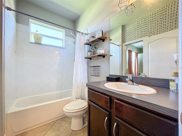 full bathroom with vanity, shower / bath combo with shower curtain, toilet, and tile patterned flooring