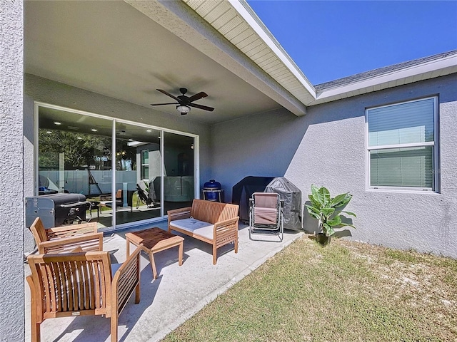 view of patio featuring ceiling fan and grilling area