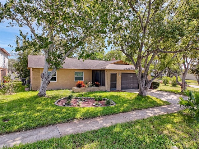 ranch-style house with a garage and a front yard