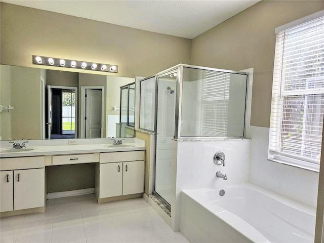 bathroom with vanity, a healthy amount of sunlight, and shower with separate bathtub