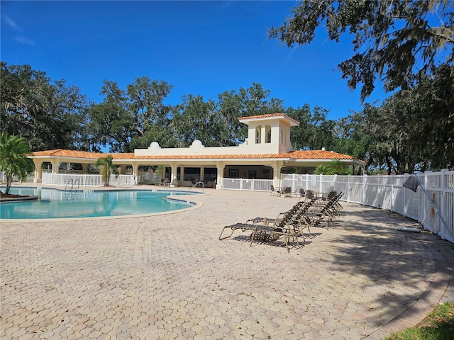 view of pool featuring a patio