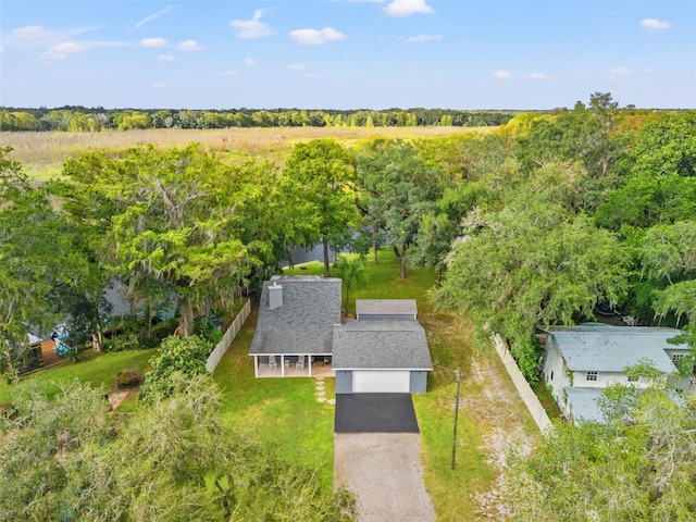 birds eye view of property with a rural view