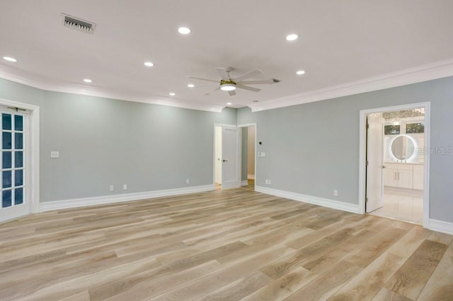 spare room with ceiling fan, crown molding, and light hardwood / wood-style flooring