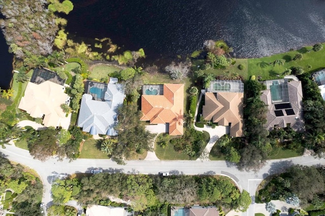 birds eye view of property featuring a water view