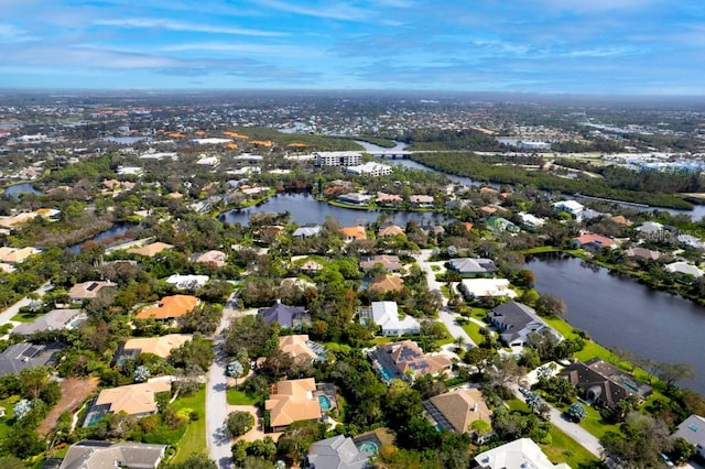 bird's eye view with a water view