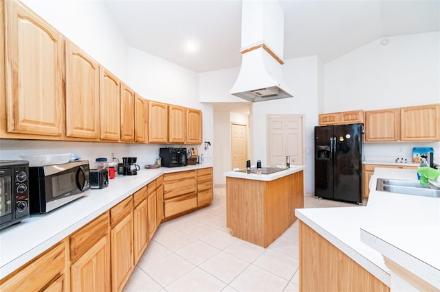 kitchen featuring black refrigerator with ice dispenser, light tile patterned floors, high vaulted ceiling, sink, and a center island