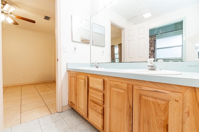 bathroom with vanity, ceiling fan, and tile patterned flooring