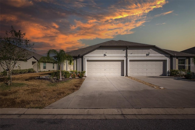 view of front of property with a garage