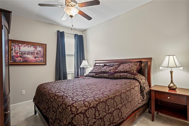 bedroom featuring ceiling fan