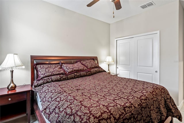 bedroom featuring ceiling fan and a closet