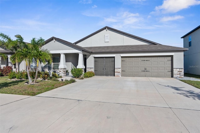 view of front of home featuring a porch and a garage