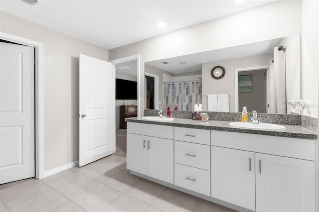 bathroom featuring vanity and tile patterned floors