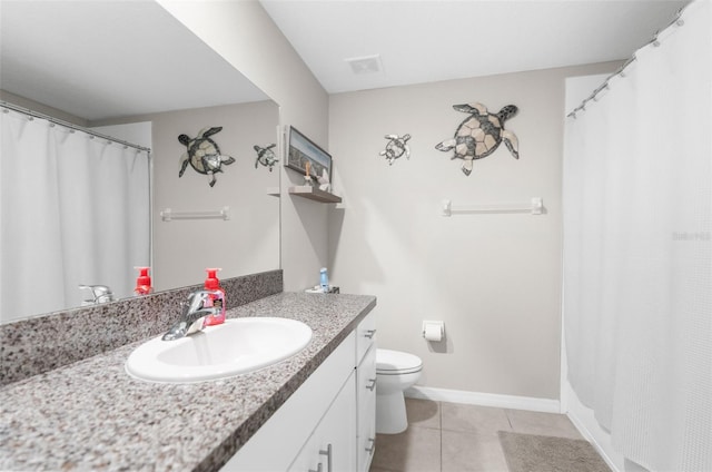 bathroom with vanity, toilet, tile patterned floors, and a shower with shower curtain