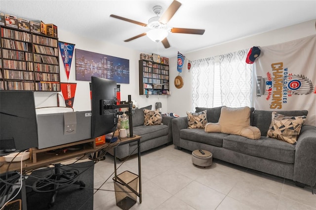 tiled living room featuring ceiling fan