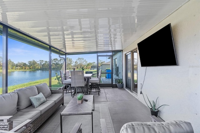 sunroom with a water view