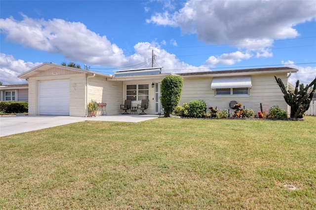 ranch-style house with a garage and a front yard