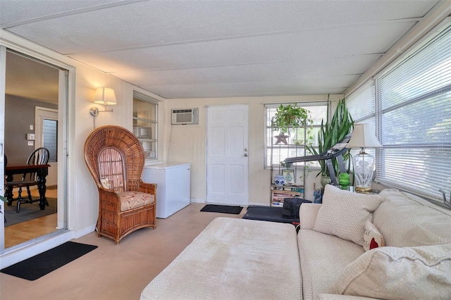 carpeted living room with a wall mounted air conditioner