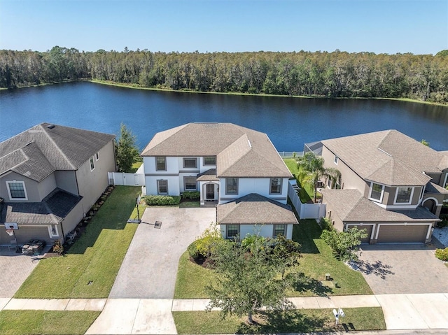 birds eye view of property featuring a water view