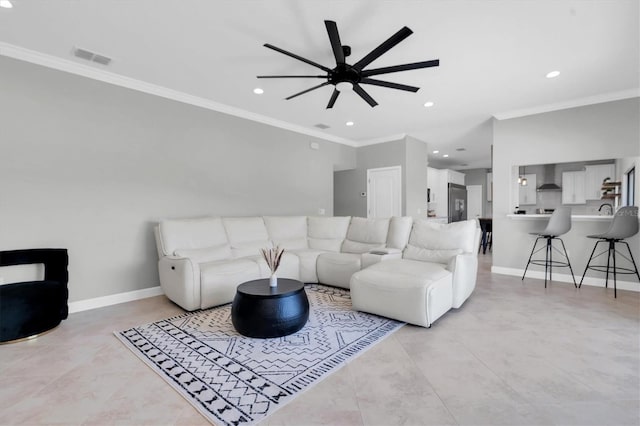 12135 Crestridge Loop, Trinity, FL 34655 - living room with crown molding, visible vents, baseboards, ceiling fan, and recessed lighting