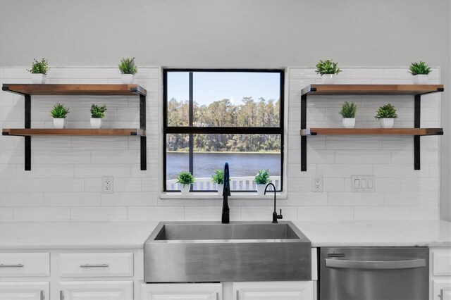12135 Crestridge Loop, Trinity, FL 34655 - kitchen featuring a sink, open shelves, backsplash, and dishwasher