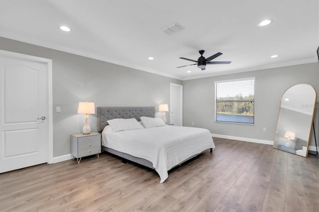 bedroom with ceiling fan, ornamental molding, and light wood-type flooring