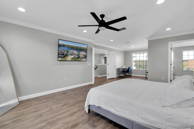 12135 Crestridge Loop, Trinity, FL 34655 - bedroom with recessed lighting, ornamental molding, baseboards, and wood finished floors