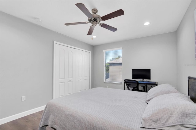 bedroom featuring wood-type flooring, a closet, and ceiling fan