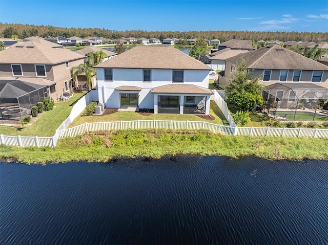 bird's eye view with a water view