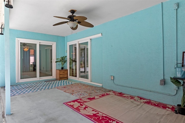 view of patio with ceiling fan