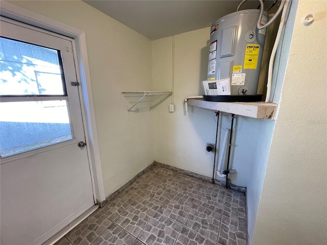 washroom featuring water heater